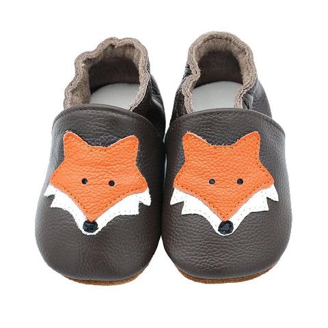 Tofflor av Fox Head läder
