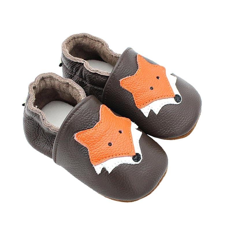 Tofflor av Fox Head läder