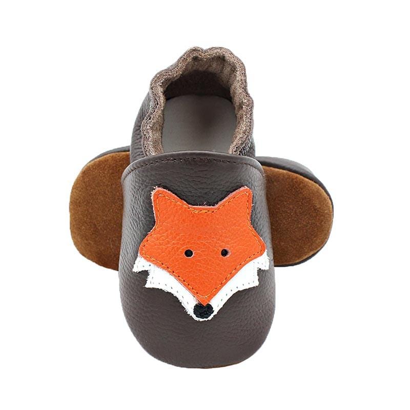 Tofflor av Fox Head läder